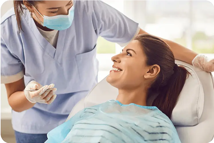 A dentist examining a patient's teeth