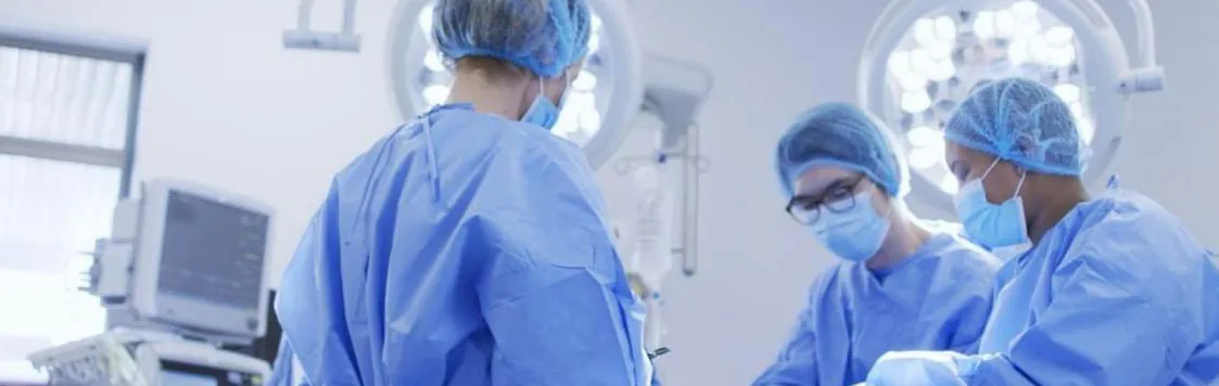 A surgical team at work in an operating theatre